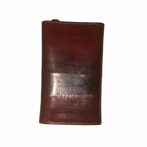 Vintage eel skin coin wallet with little hooks.
